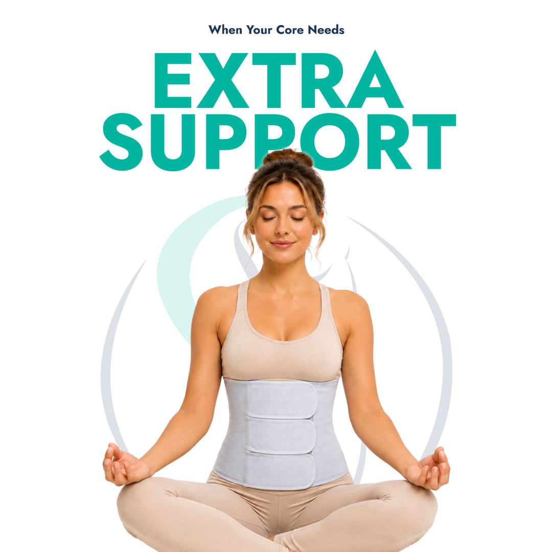 A woman sitting comfortably in a cross-legged pose wearing the grey SUPEAK postpartum abdominal binder, with bold text reading "When Your Core Needs EXTRA SUPPORT."